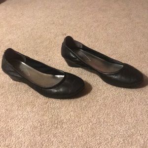 Black leather flats with low heel